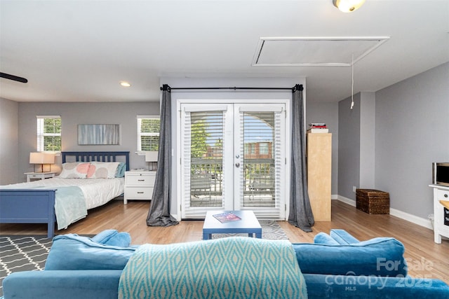 501 Mercury St, Charlotte, NC 28205 - bedroom featuring attic access, access to outside, wood finished floors, and recessed lighting