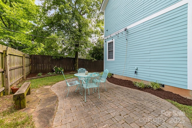 501 Mercury St, Charlotte, NC 28205 - fenced backyard featuring outdoor dining area and a patio area