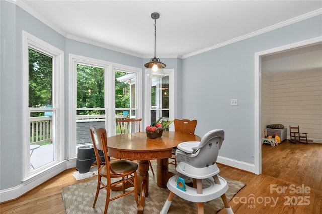8300 Quarters Ln, Mint Hill, NC 28227 - dining room featuring light wood-style flooring and crown molding