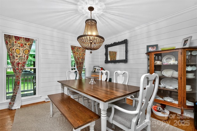 8300 Quarters Ln, Mint Hill, NC 28227 - dining area with ornamental molding, a chandelier, and wood finished floors