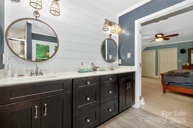 8300 Quarters Ln, Mint Hill, NC 28227 - full bathroom featuring double vanity, ornamental molding, a ceiling fan, and a shower with shower door
