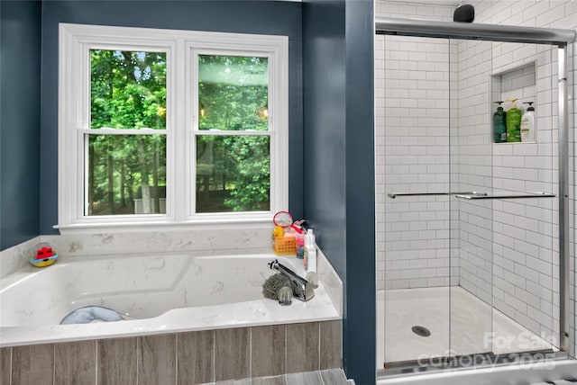 8300 Quarters Ln, Mint Hill, NC 28227 - full bath with healthy amount of natural light, a shower stall, and a garden tub