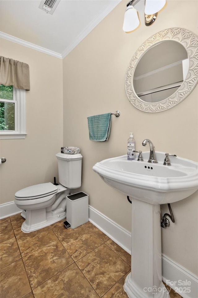 8300 Quarters Ln, Mint Hill, NC 28227 - half bathroom featuring ornamental molding and tile patterned floors