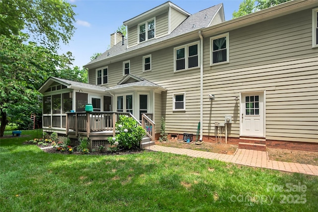 8300 Quarters Ln, Mint Hill, NC 28227 - rear view of house featuring a sunroom, a wooden deck, and a lawn