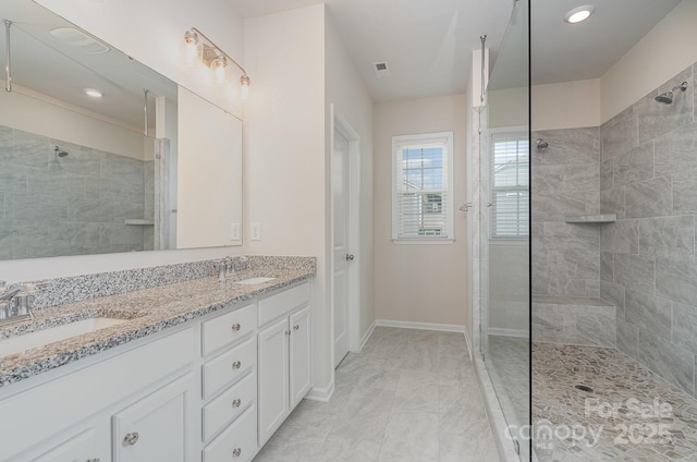 8420 Golden Stone Ln Unit 138, Fort Mill, SC 29707 - bathroom featuring a walk in shower, marble finish floors, double vanity, and recessed lighting