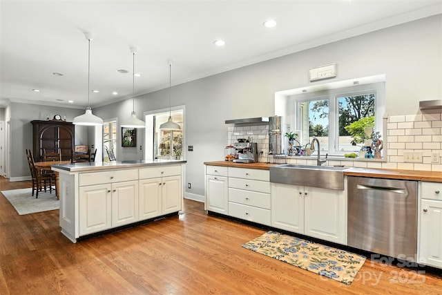 1009 13th Avenue Pl NW Unit 19, Hickory, NC 28601 - kitchen with stainless steel dishwasher, wooden counters, decorative backsplash, recessed lighting, and white cabinetry