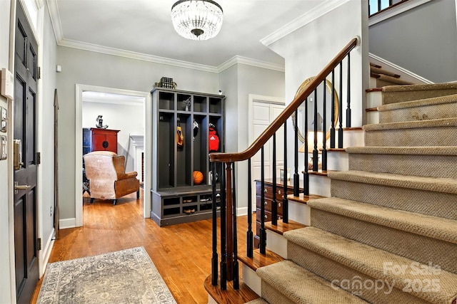 1009 13th Avenue Pl NW Unit 19, Hickory, NC 28601 - foyer featuring stairway, ornamental molding, wood finished floors, and a chandelier