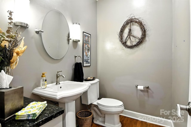 1009 13th Avenue Pl NW Unit 19, Hickory, NC 28601 - bathroom featuring toilet and wood finished floors