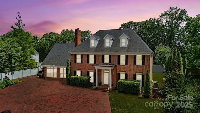 1009 13th Avenue Pl NW Unit 19, Hickory, NC 28601 - colonial home with a chimney, decorative driveway, and brick siding