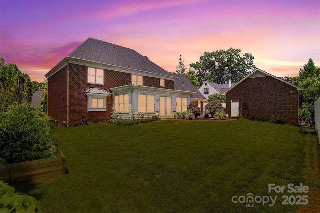 1009 13th Avenue Pl NW Unit 19, Hickory, NC 28601 - rear view of property featuring brick siding and a lawn