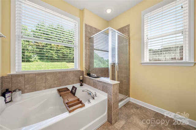 1152 Mckee Farm Ln, Belmont, NC 28012 - bathroom with a bath, a shower stall, plenty of natural light, and tile patterned flooring