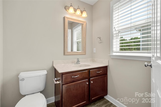 1152 Mckee Farm Ln, Belmont, NC 28012 - half bathroom featuring vanity and wood finished floors