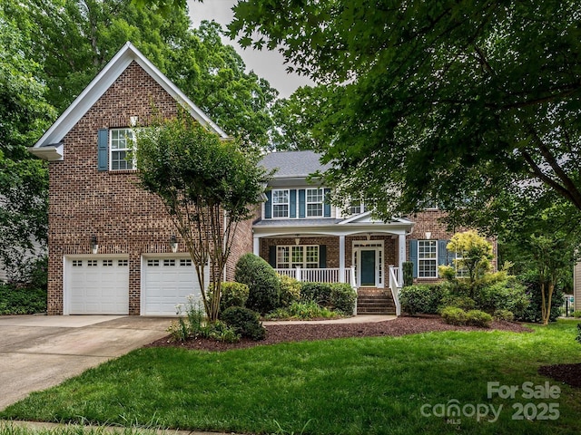 9212 John Hawks Rd, Cornelius, NC 28031 - traditional-style house with brick siding, driveway, an attached garage, a front lawn, and covered porch