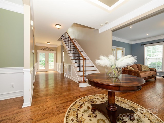 9212 John Hawks Rd, Cornelius, NC 28031 - entryway featuring french doors, stairs, wood finished floors, plenty of natural light, and a wainscoted wall
