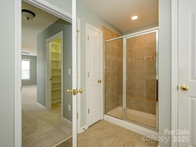 9212 John Hawks Rd, Cornelius, NC 28031 - bathroom with a shower stall, recessed lighting, and tile patterned flooring