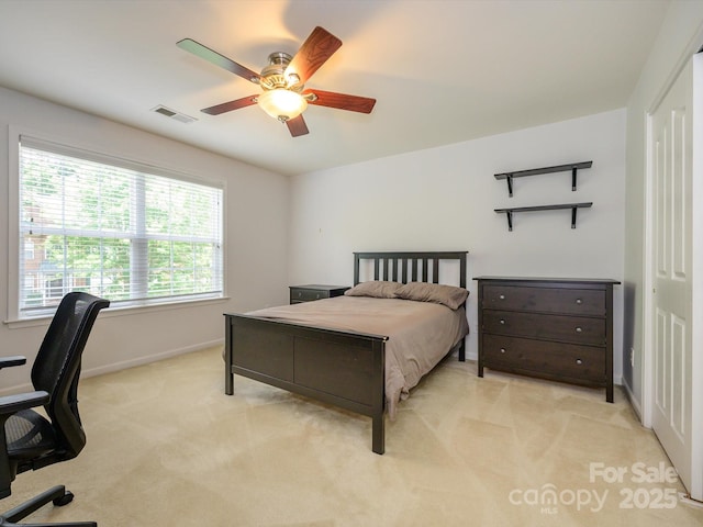 9212 John Hawks Rd, Cornelius, NC 28031 - bedroom with light colored carpet and ceiling fan