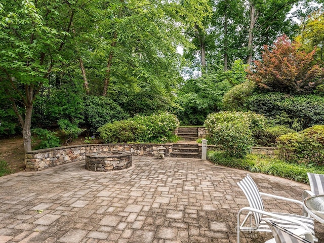 9212 John Hawks Rd, Cornelius, NC 28031 - view of patio / terrace featuring an outdoor fire pit and stairway