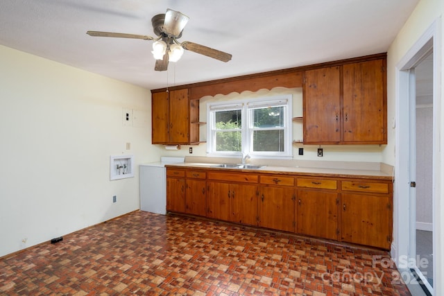 4022 Price Short Cut Rd, Monroe, NC 28110 - kitchen with a ceiling fan, brown cabinetry, and light countertops