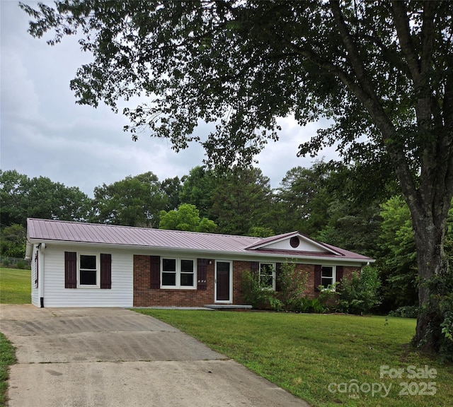 125 Heritage View Rd, Hickory, NC 28601 - single story home with concrete driveway, a front yard, brick siding, and a metal roof
