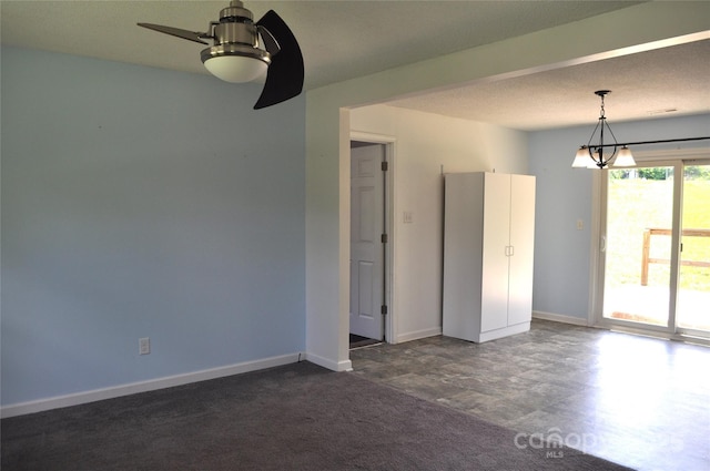 125 Heritage View Rd, Hickory, NC 28601 - spare room featuring ceiling fan and baseboards