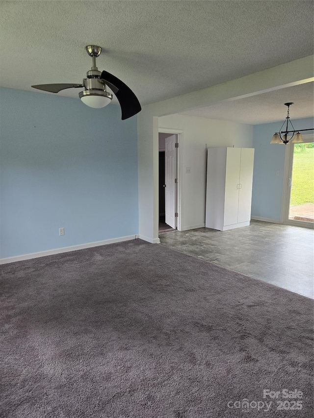 125 Heritage View Rd, Hickory, NC 28601 - spare room with carpet flooring, ceiling fan, a chandelier, and a textured ceiling