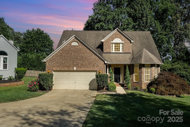 19509 Trintella Ln, Cornelius, NC 28031 - traditional-style home featuring concrete driveway, brick siding, an attached garage, and a lawn