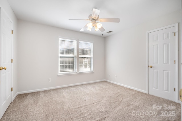 19509 Trintella Ln, Cornelius, NC 28031 - unfurnished bedroom with carpet floors and a ceiling fan