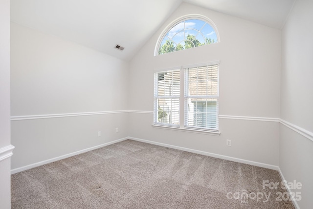 19509 Trintella Ln, Cornelius, NC 28031 - carpeted empty room featuring plenty of natural light and high vaulted ceiling