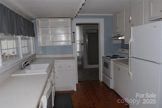 510 5th St, Spencer, NC 28159 - kitchen with white appliances, under cabinet range hood, dark wood-type flooring, white cabinets, and crown molding