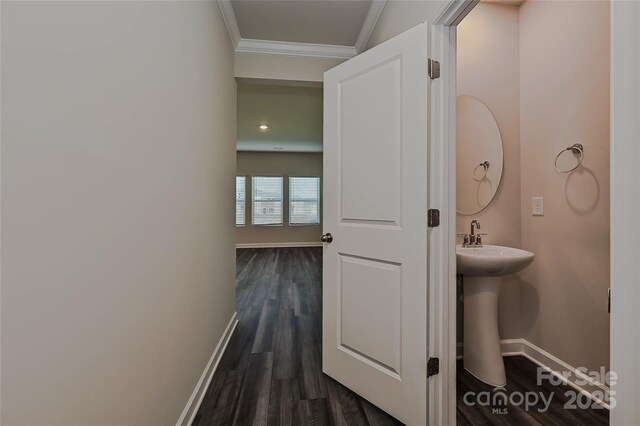 1410 31st St NE, Conover, NC 28613 - bathroom with ornamental molding and wood finished floors