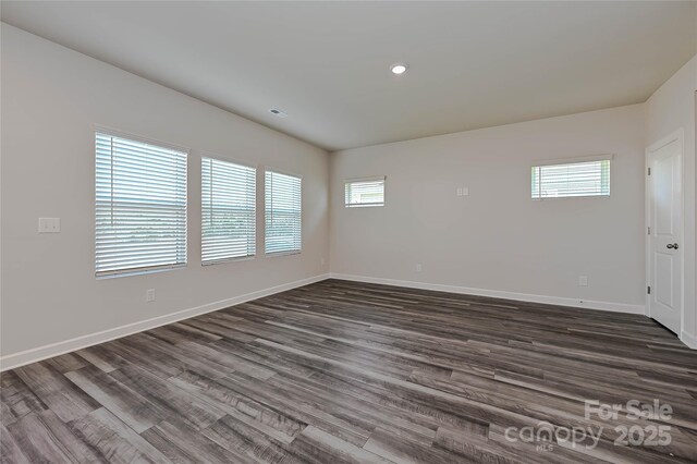 1366 31st St NE, Conover, NC 28613 - unfurnished room featuring dark wood-style floors and recessed lighting