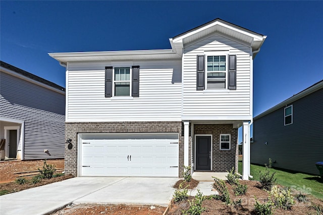 1442 31st St NE, Conover, NC 28613 - view of front of home featuring brick siding, an attached garage, and concrete driveway