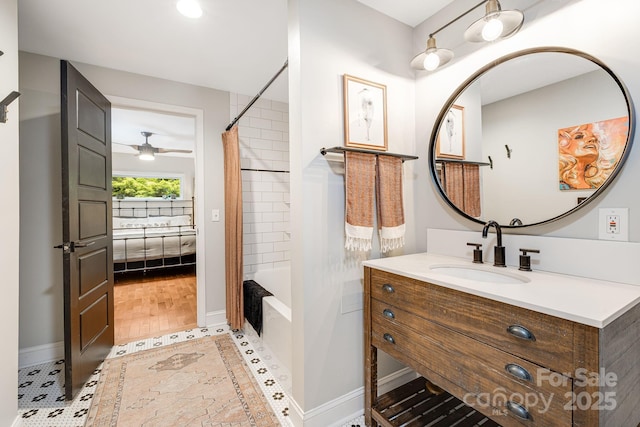 90 Reed Rd, Asheville, NC 28805 - full bathroom featuring vanity, shower / bath combo with shower curtain, a ceiling fan, and ensuite bath
