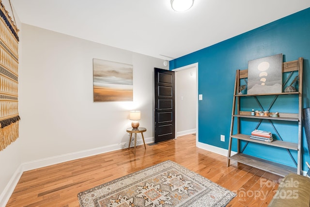 90 Reed Rd, Asheville, NC 28805 - sitting room with wood finished floors and baseboards