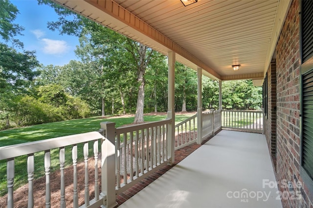 4323 Crow Rd, Monroe, NC 28112 - porch featuring view of scattered trees and a yard