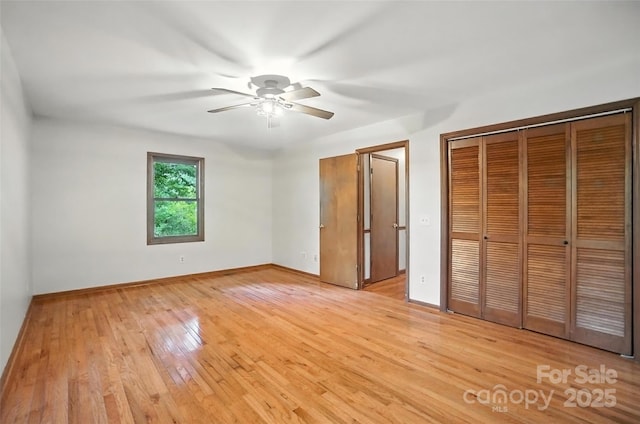 4323 Crow Rd, Monroe, NC 28112 - unfurnished bedroom with light wood-style flooring, a closet, and a ceiling fan