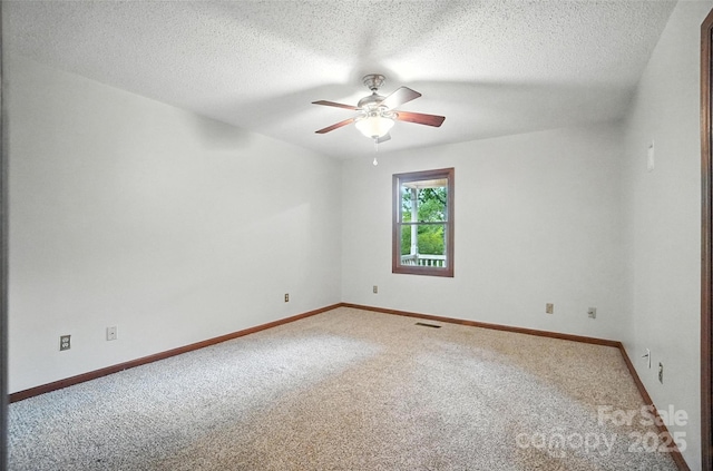 4323 Crow Rd, Monroe, NC 28112 - carpeted empty room featuring a ceiling fan and a textured ceiling