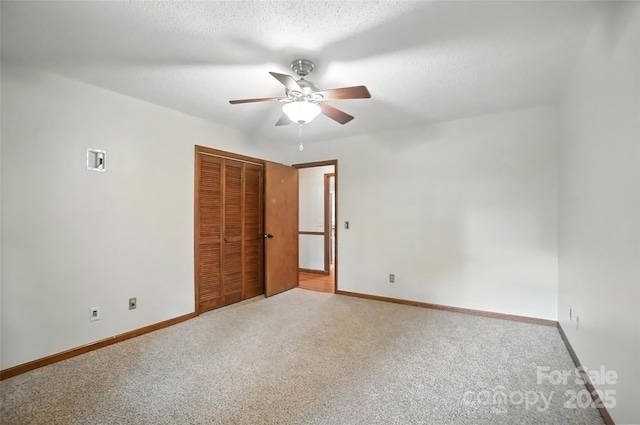 4323 Crow Rd, Monroe, NC 28112 - unfurnished bedroom with a closet, carpet floors, ceiling fan, and a textured ceiling