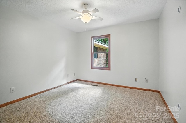 4323 Crow Rd, Monroe, NC 28112 - unfurnished room with carpet flooring, a textured ceiling, and a ceiling fan
