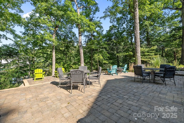 13934 Kings Carriage Ln, Charlotte, NC 28278 - view of patio featuring outdoor dining area