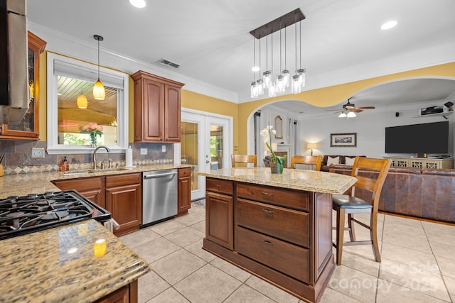 13934 Kings Carriage Ln, Charlotte, NC 28278 - kitchen with stainless steel dishwasher, arched walkways, a kitchen breakfast bar, ceiling fan, and light stone countertops