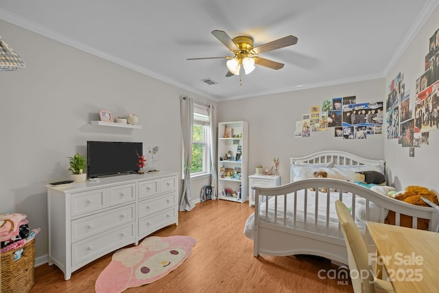 13934 Kings Carriage Ln, Charlotte, NC 28278 - bedroom with light wood-style flooring, ornamental molding, and ceiling fan