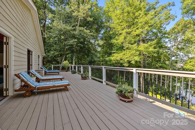 13934 Kings Carriage Ln, Charlotte, NC 28278 - wooden deck with view of scattered trees