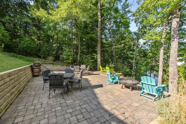 13934 Kings Carriage Ln, Charlotte, NC 28278 - view of patio with an outdoor fire pit and outdoor dining space