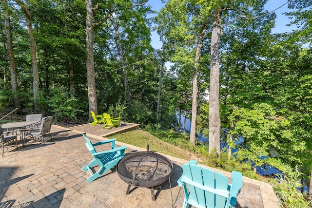 13934 Kings Carriage Ln, Charlotte, NC 28278 - view of patio with an outdoor fire pit and outdoor dining area
