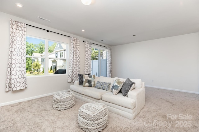 9221 Widden Way, Charlotte, NC 28269 - carpeted living room featuring recessed lighting