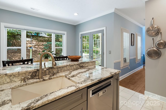 609 Carriage Commons Dr, Hendersonville, NC 28791 - kitchen featuring dishwasher, light stone countertops, ornamental molding, recessed lighting, and light tile patterned floors