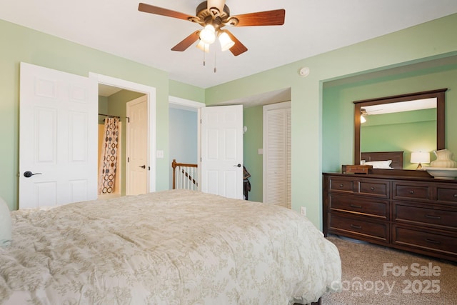609 Carriage Commons Dr, Hendersonville, NC 28791 - bedroom featuring carpet floors, a closet, and ceiling fan