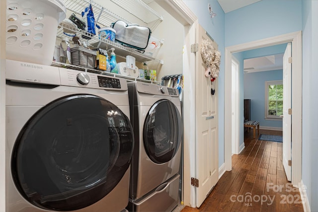 609 Carriage Commons Dr, Hendersonville, NC 28791 - washroom with washer and clothes dryer and dark wood-type flooring