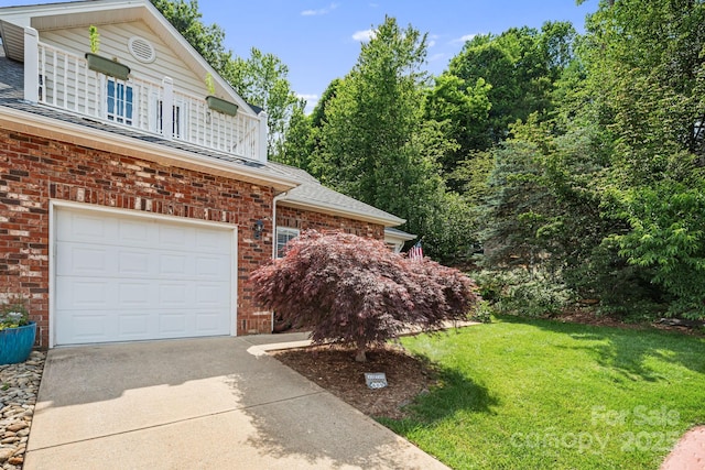 609 Carriage Commons Dr, Hendersonville, NC 28791 - view of front of house with brick siding, concrete driveway, a front yard, and a shingled roof